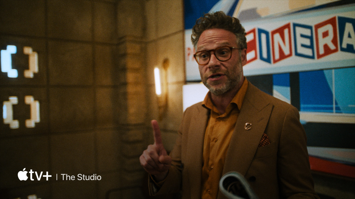 A flatscreen television showing a video of all Apple services available on Apple TV