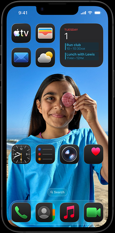 iPhone 16e dikelilingi berbagai aplikasi, seperti mail Apple, WhatsApp, Safari, peta Apple, Apple Music, foto, catatan, dan home