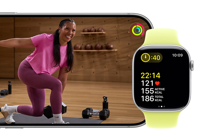 Apple Watch Series 11 tracks workout while iPhone plays Fitness+ workout video