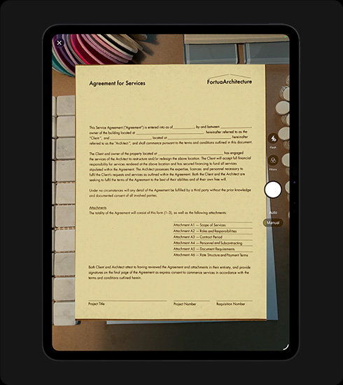 iPad Pro, front exterior, portrait orientation, space black colour, display showing a scanned document titled “Agreement for Services” with text and signature lines clearly visible