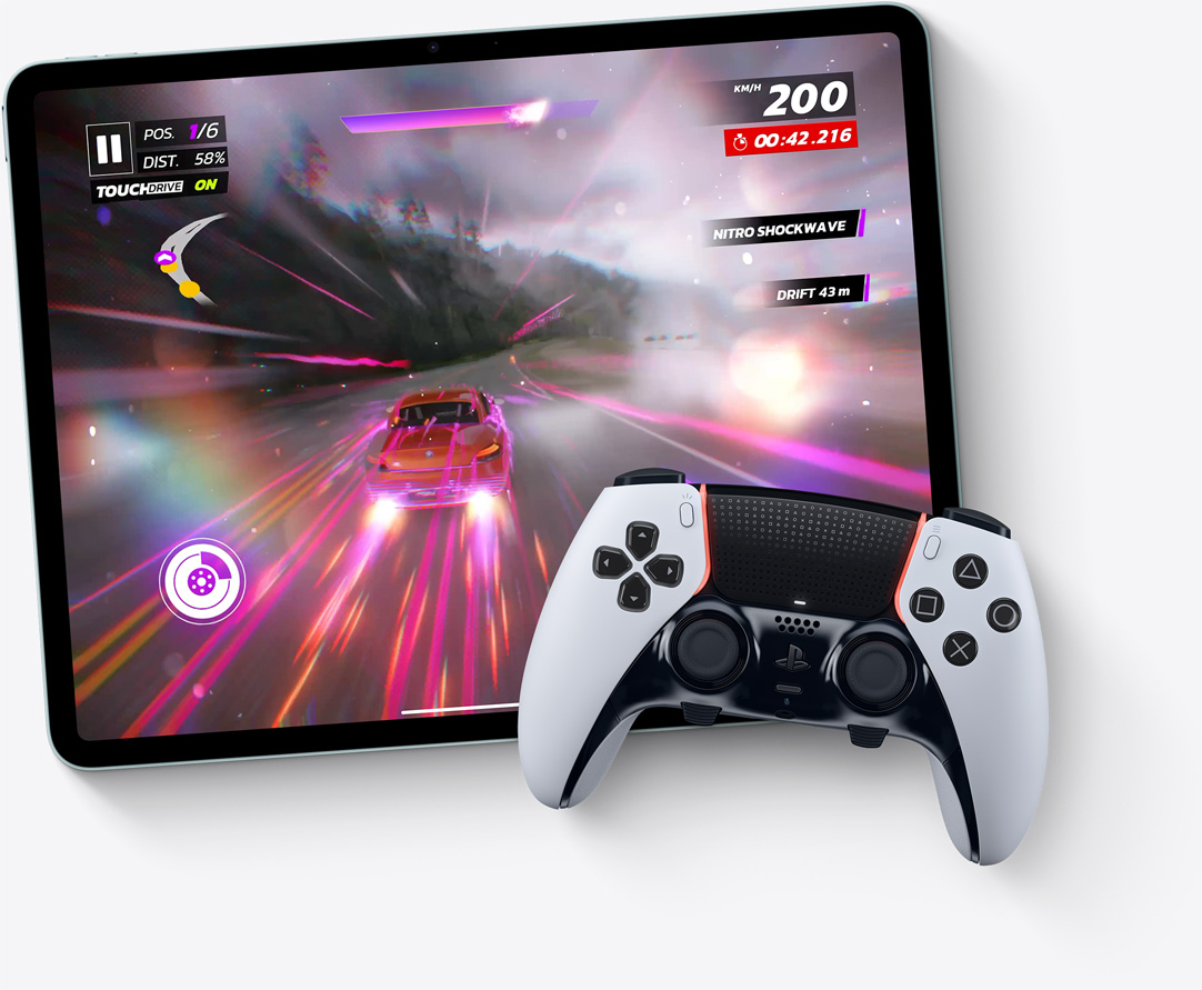 iPad Air, landscape orientation, screen displays video game Asphalt Legends Unite, Playstation controller