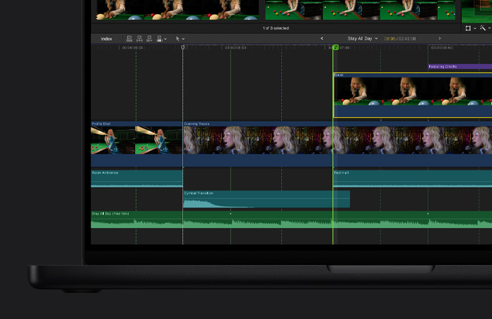 MacBook Pro 16 screen, Final Cut Pro timeline featuring video clips of three different scenes, a woman playing billiards, woman singing into a microphone