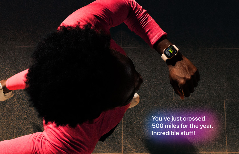 A person checks progress on Apple Watch Series 11 Workout app while running