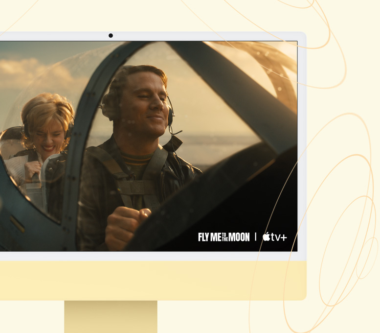 Kollane iMac. Ekraanil kuvatakse Apple TV+ saadet