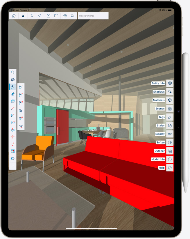iPad Air w orientacji pionowej z przyłączonym Apple Pencil, na ekranie widać kolorową grafikę
