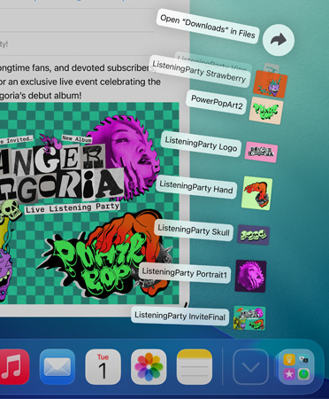 Et nærbilde viser Dock nederst på skjermen, med filer i viftemønster vertikalt fra Dock.